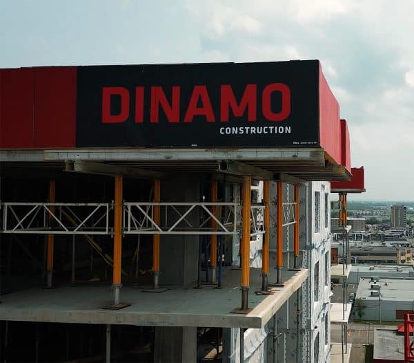A high-angle view of a building under construction by Dinamo Construction.